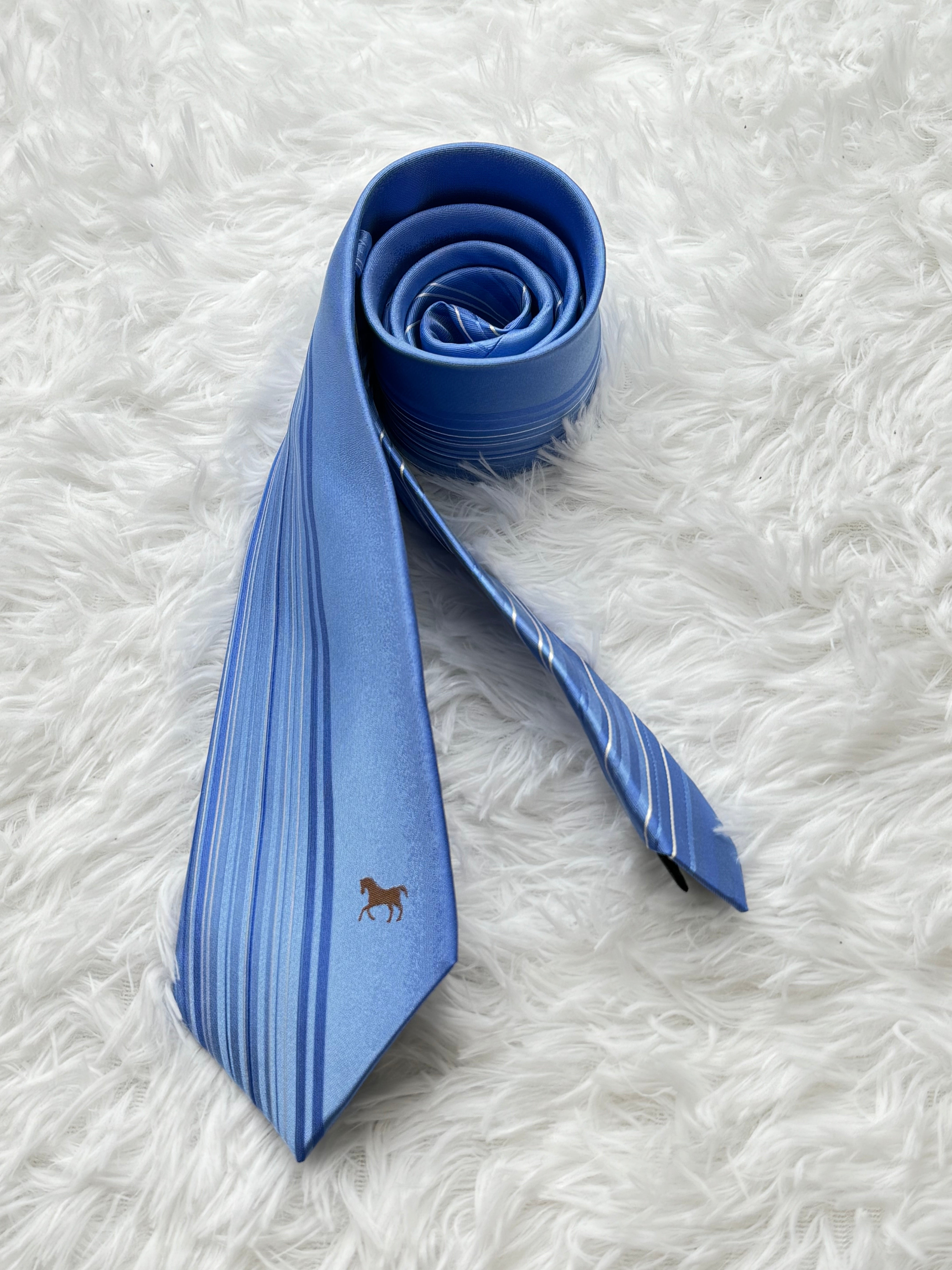 Light blue business tie with beveled edge stripes